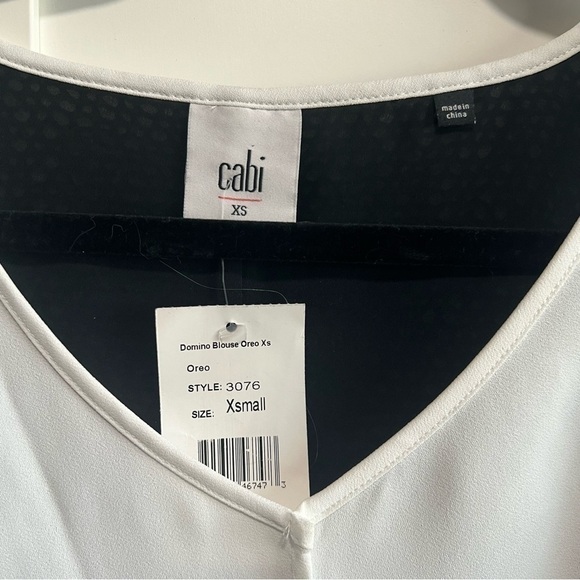 Cabi #3076 Domino White Blouse Hi-Lo
Cutout Split Black Mesh Back, New with Tags - Picture 4 of 4